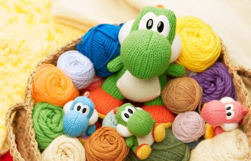 nintendo: Here we find a Yarn Yoshi amiibo family in their natural habitat. Be careful not to distur