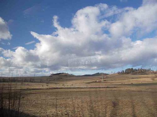 Clouds &amp; fields seen from a train - polish countryside - Lower Silesia, Poland.