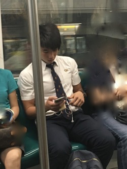 uniboysg:Cutie spotted on train. What a fine