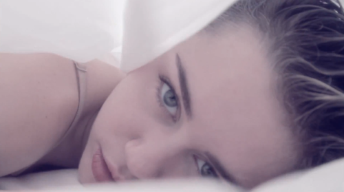 Go between the sheets with Miley in the #VEVOPremiere of &ldquo;Adore You.&rdquo;