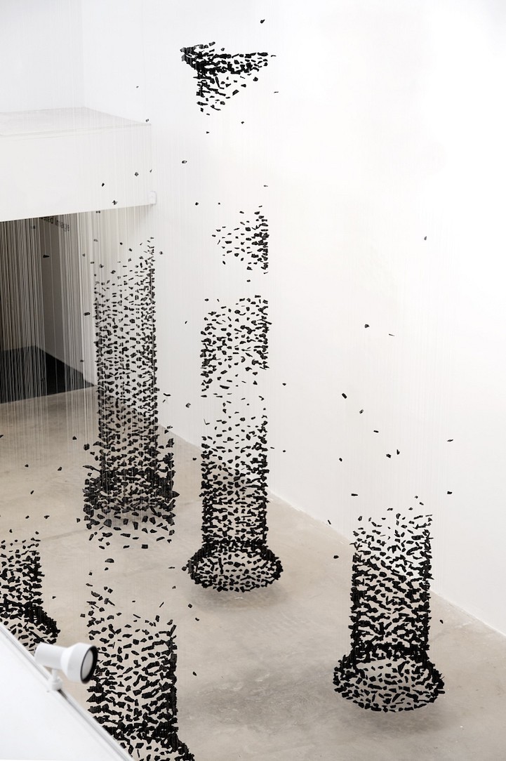 jedavu:  Columns of Suspended Charcoal Explore Relationship Between Nature and Man