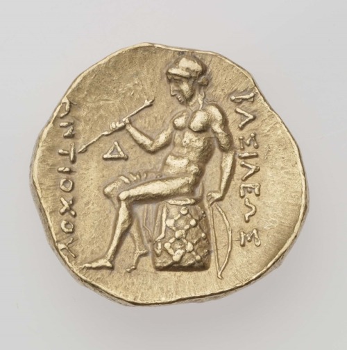 Stater of Kingdom of Syria with head of Antiochos I Soter (obverse) and Apollo seated on a netted om