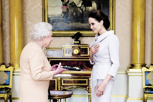 georgeslays:  Angelina Jolie presented with a honorary damehood by The Queen in recognition