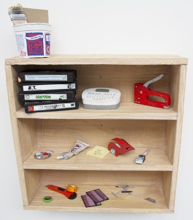 William Emmert — A lot of People Do This @@ Guerrero Gallery
By Eric Dyer
Organize; cherish. Sentimental value; utility. There are small objects in studio shelves on the walls housing VHS tapes (1), packaging tape, two used foam brushes, a notebook,...