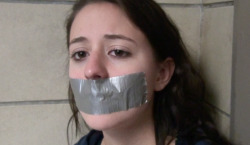 tapeonfilm:The head of the cheerleading team at my school, Jenn loved getting her mouth duct taped shut 