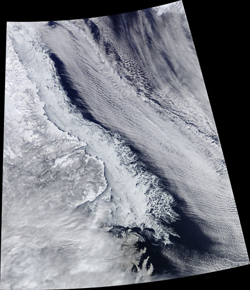 An Intersection of Land, Ice, Sea and Clouds : Though sea ice has been significantly below normal ex