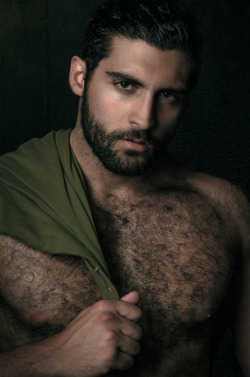 OMG he is handsome, hairy, sexy and with a nice looking bulge - my kind of man - WOOF