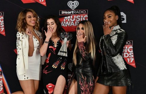 Fifth Harmony accepting the Taco Bell #BestFanArmy and Best Cover at the iHeart Awards.
