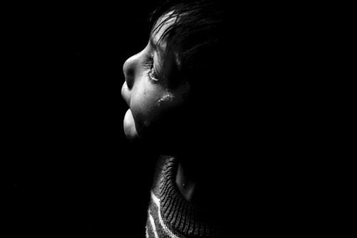 Myanmar, Yangon, 2008 l Photo: Pauline Maisonneuve Portrait of a Burmese young boy waiting at the Ya