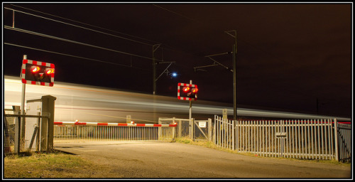 britishrailways:  Train light trails at Dam Dykes Level Crossing, Cramlington, Northumberland by mikeplonk on Flickr.