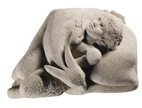 Satyr Entwined with a Deer.Stone.Length : 82 cm.Executed in the first half of the 20th century.Engla