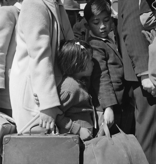 bygoneamericana: Third generation Japanese-American children awaiting the arrival of the next bus. B