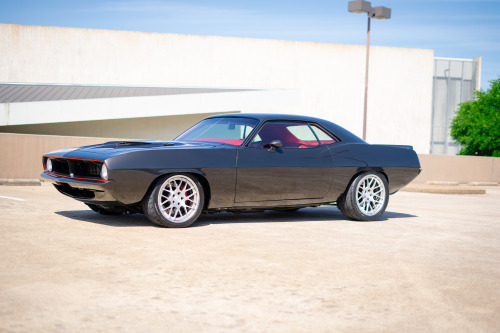  Burn it to the wick. Craig Johnson’s amazing pro-touring 1970 Plymouth Barracuda was built by Kille