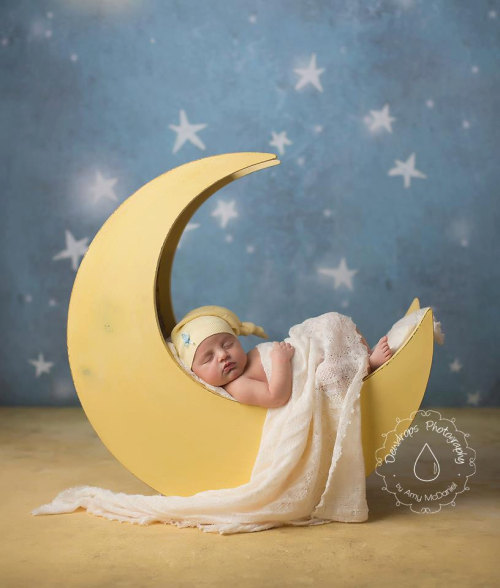 I want to convert this gorgeous moon photo prop into a bookcase or child’s chair after tucking the upcoming baby into it for the most adorable nap ever.
Source: Mr and Mrs and Company