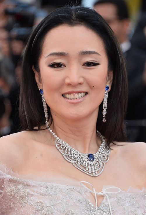 Li Bingbing, Gong Li, Lily Donaldson (in Saint Laurent and Atelier Swarovski jewelry) at the Opening