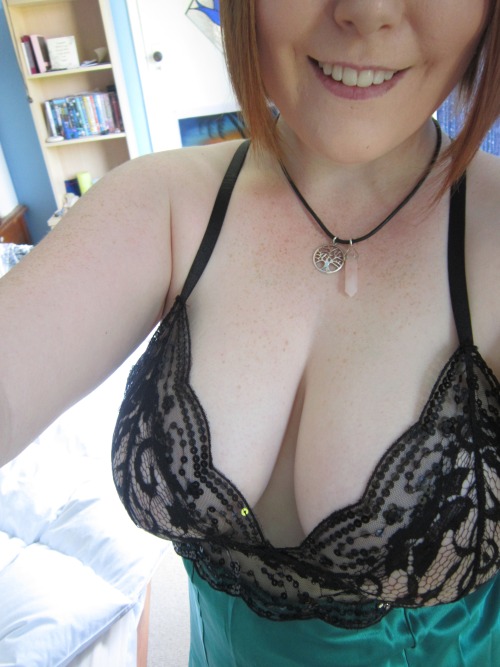 That fabulous smile and of course smazing cleavage. Make sure you check out her blog. She is lovely