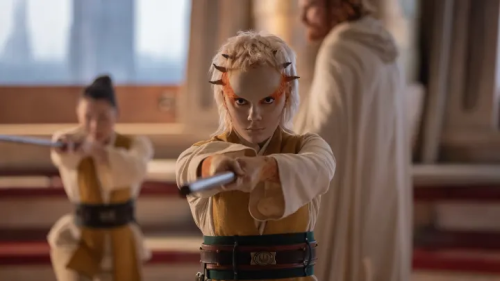 Screenshot from The Acolyte, showing Jedi Padawan Jecki practicing her lightsaber forms using a Bokken saber training staff