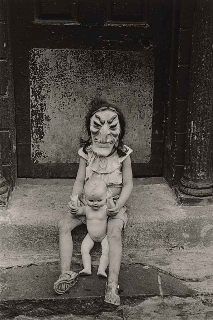 elayesildogan:  Diane Arbus: Masked Child with a Doll, 1961. 