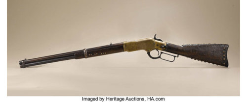 Tacked Winchester Model 1866 lever action rifle belonging to Blackfoot Chief Curley Bear.from Herita