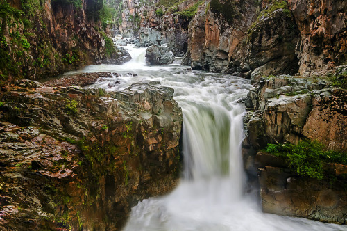 Aharbal FallsThe small Veshu River flows north, carrying snowmelt out of the Pir Panjal range down i