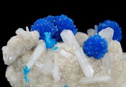 Mineralists:  Some Electric Blue Cherries Of Cavansite Are Visible Over The Withish