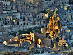 welcometoitalia:  Matera is a city in the region of Basilicata, southern Italy. It lies in a small canyon carved out by the river Gravina. Known as La Città Sotterranea (Subterranean City), it is well known for its historical center (Sassi), a UNESCO