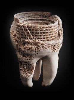 opticallyaroused:  A sculpture of the Roman Colosseum, done in a real tooth. 