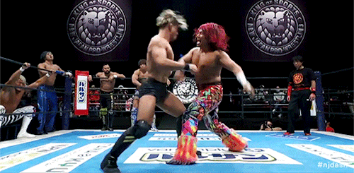 mith-gifs-wrestling:The new IWGP double champ, Kota Ibushi, in the background really enjoying seeing