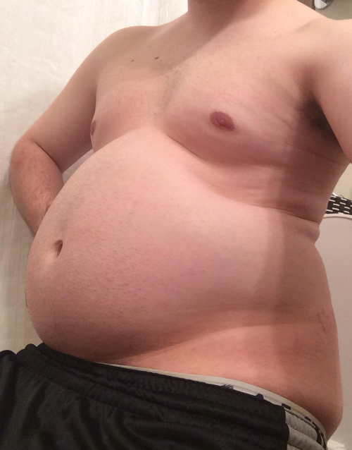 bellylover111:  So I obviously keep growing 😏  Im so stuffed and inflated… It hurts to move, I feel so huge and round! I decided to see how much i could eat tonight and then seeing and feeling the massive size of my giant gut decided ‘hey why not