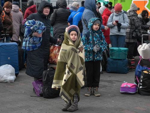 eowyntheavenger:Refugees arriving in Poland from Ukraine on Monday wait to board buses and trains to