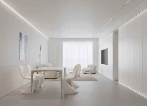 Minimalist White Interiors With Unique Furniture Designs