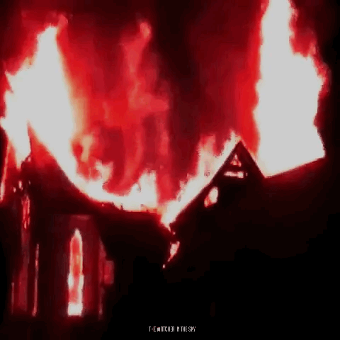 a gif of a flaming building