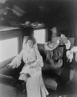 warrenpearce69:   Two women reading in a railroad passenger car, circa 1905. 