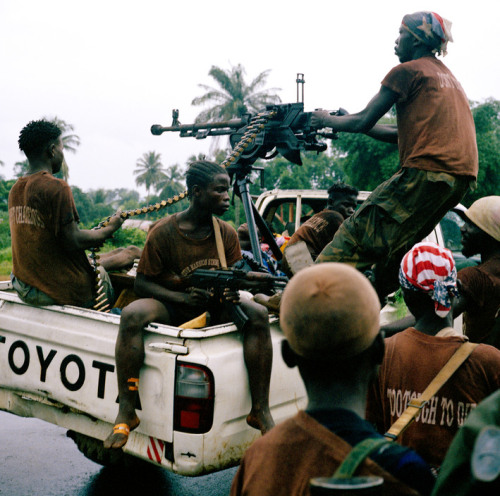 soldiers-of-war:LIBERIA. Monrovia. June 25, 2003. One of the most influencial weapons in the rebel f