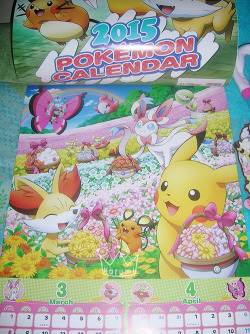 look at my lovely new calendar &lt;3 this has to be one of my newest favorite illustrations, a bunch of my favorite pokemon together picking flowers eee