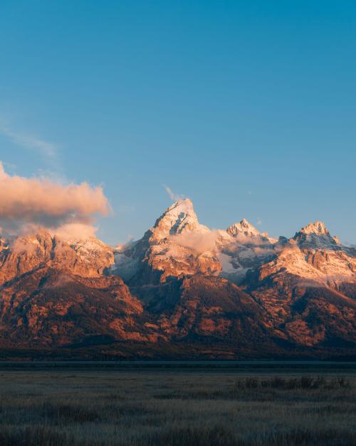 oneshotolive:  Early morning light shining bright on the Teton Range, Wyoming [OC] [3601 × 4501] @itk.jpeg 📷: itk_jpeg 