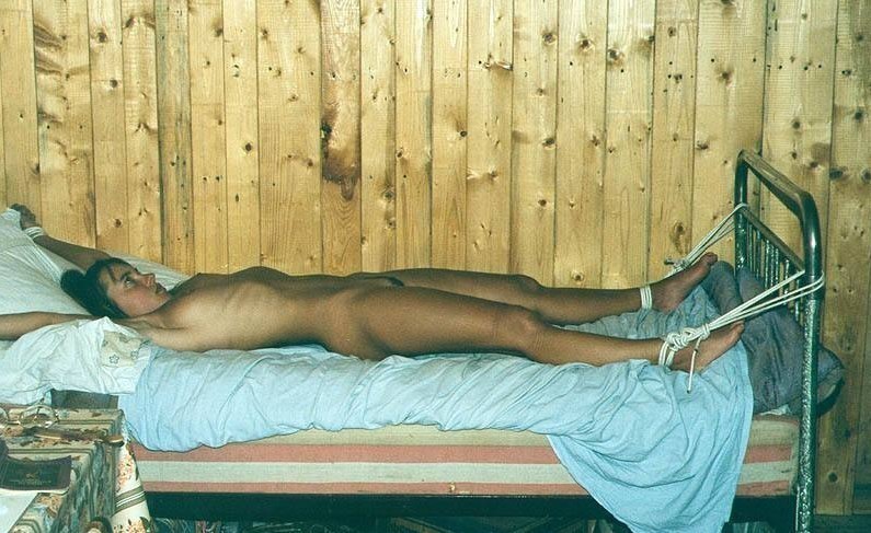 bondageisfun:  Waking up and discovering she naked and tied spread eagle in a room