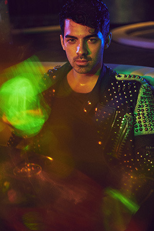 DECEMBER 2015: Joe Jonas poses for GQ Italia. Diesel Black Gold Lustice Studded Leather Jacket &