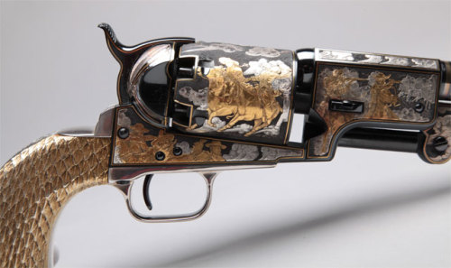 Gold and silver Colt Third Model Dragoon Revolver owned by western singer/actor Gene Autry.Decoratin