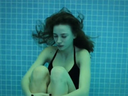 purified-souls:My upload don’t delete source or this comment. This is a scene from a Turkish show called Medcezir where this girl in the photo Mira (Serenay Sarikaya) is struggling with all her problems and takes her stress out by swimming eventually