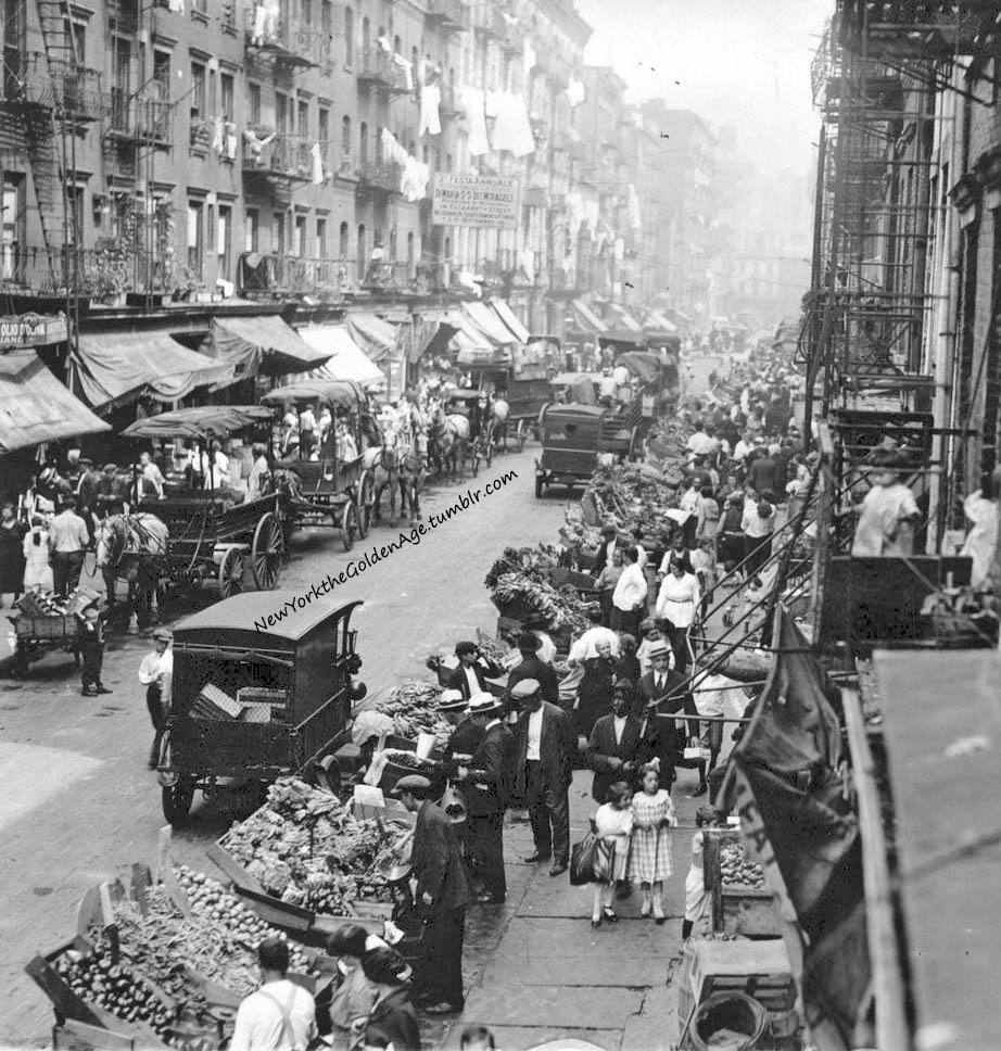 A Street In One Of The Italian Neighborhoods Of The City Lined With a-street-in-one-of-the-italian-neighborhoods-of-the-city-lined-with