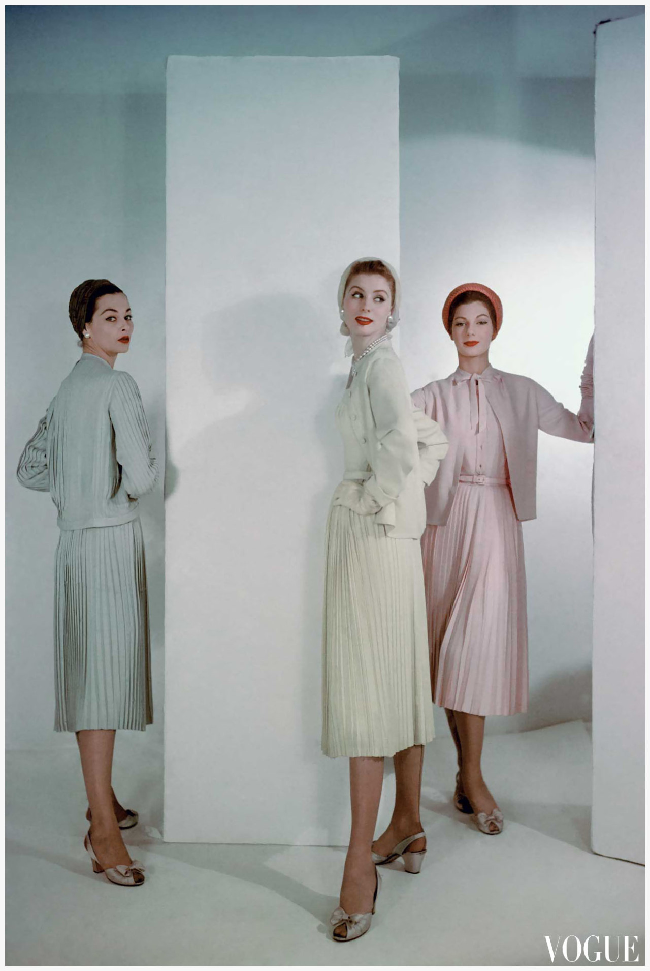 vintagechampagnefever:  1953 pastel fashions photographed for Vogue  