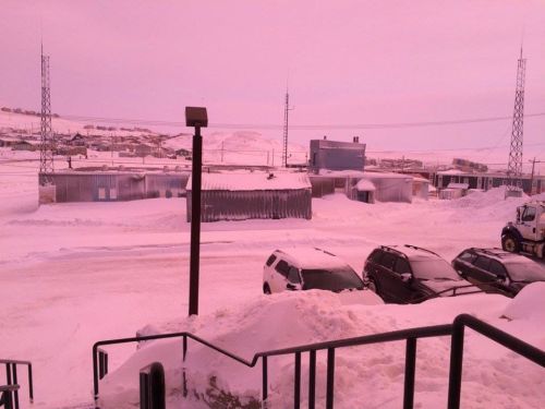 coolthingoftheday: Canada’s northernmost capital city, Iqaluit, briefly turned pink and purple