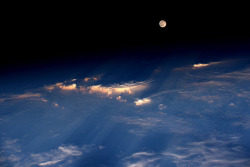 just&ndash;space: Space Station View of the Full Moon : Expedition 48 Commander Jeff Williams of NASA took this photograph on June 21, 2016, from the International Space Station, writing, A spectacular rise of the full moon just before sunset while flying