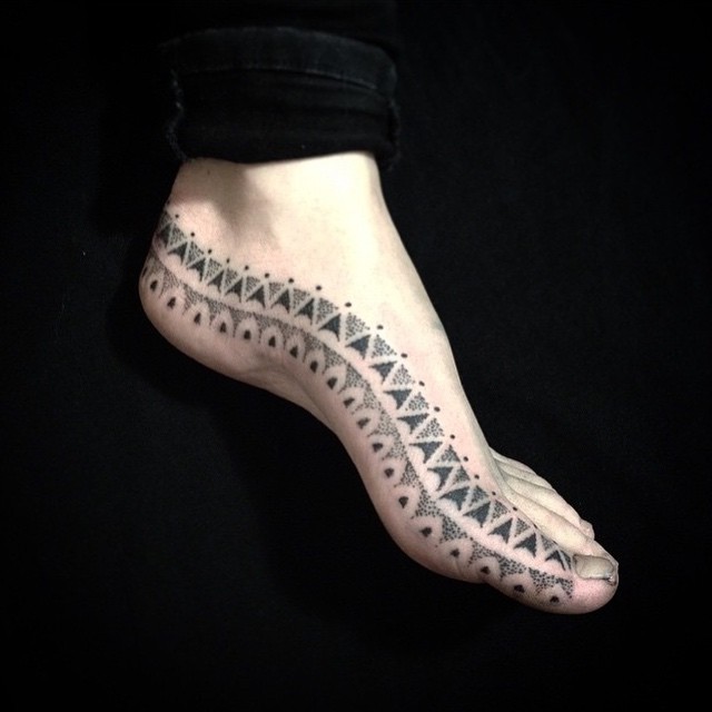 tribal foot tattoo