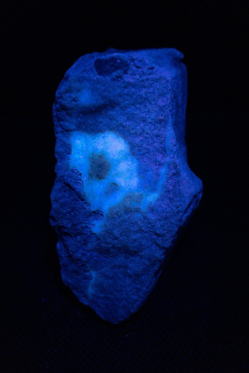 Opal in Sandstone displaying fluorescenceLocality: Unknown375nm (Longwave) UV Light