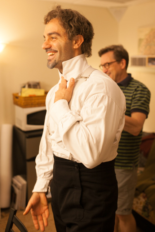 Ramin Karimloo shares in a light hearted conversation backstage with his dresser, Lyle Jones. Photo 