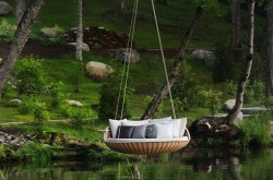 shadow-in-fog:  mymodernmet: Swing Rest by Daniel Pouzet A hanging couch that offers the ultimate relaxation of a swing to lounge on in nature. 