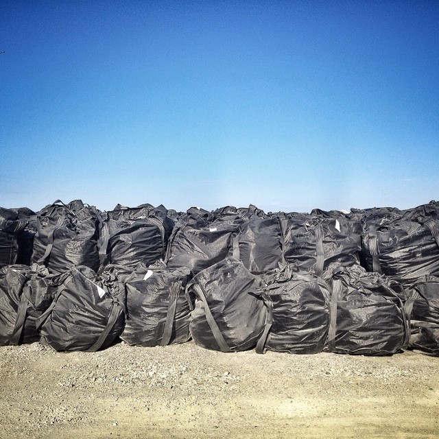 Sacks of radioactive material stored in large black bags near the destroyed Fukushima Daiichi Nuclear Power Plant, Japan. It is three and a half years since the ‘triple-disaster’ hit Japan with a large Earthquake, Tsunami, and nuclear disaster...