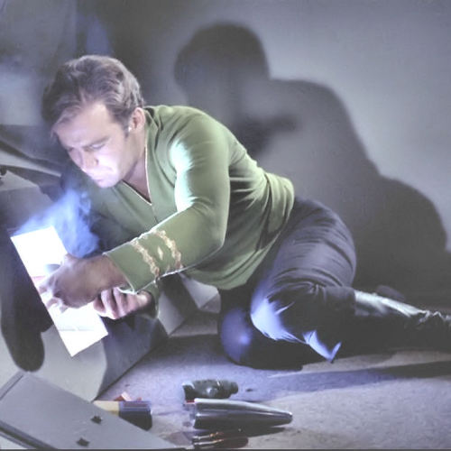 aconitum-trek:Jim Kirk, proving he’s not all ripped shirts and dashing looks and command decisions. 